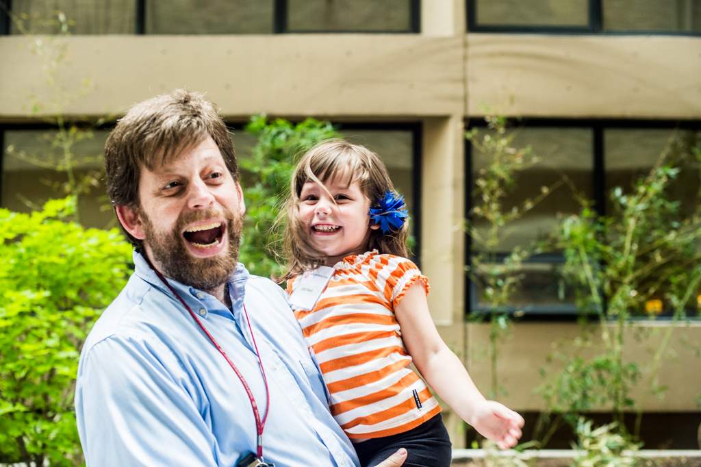 A man and a child outside