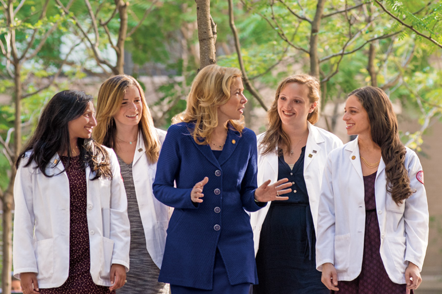 five women talking outside