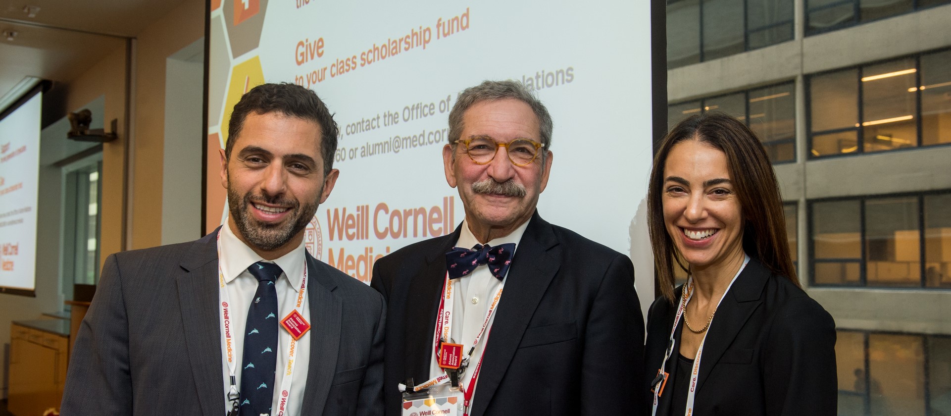 three board members smiling 