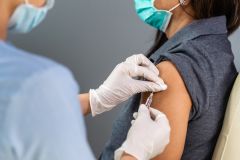 someone receiving a covid vaccine